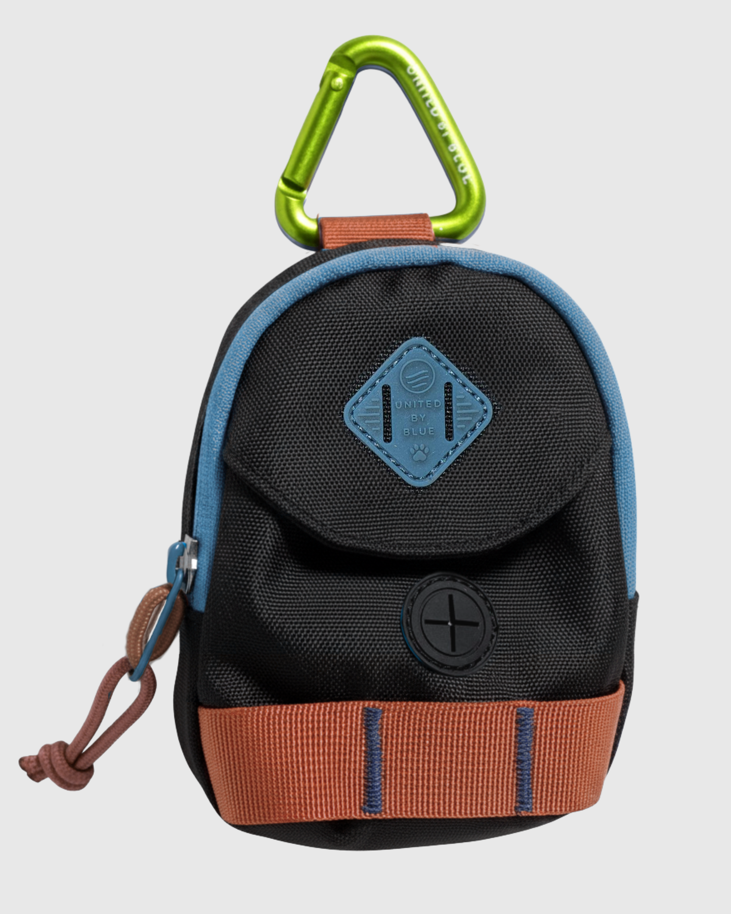 Black Multi (R)evolution™ Dog Waste Bag Dispenser (Angle): Mini black canvas dispenser with blue trim, brown strap, and green carabiner