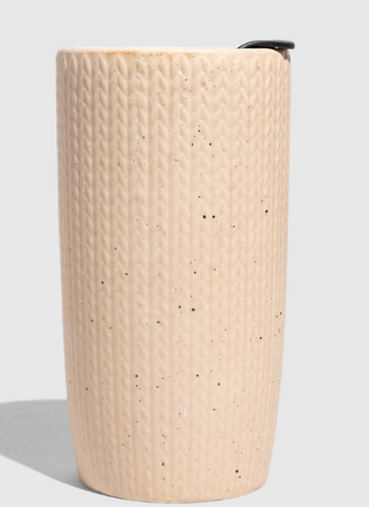 Shortbread-Knit 10 oz. Insulated Stoneware Travel Mug (Front): Tall cream speckled stoneware cup with knit texture and black lid clip