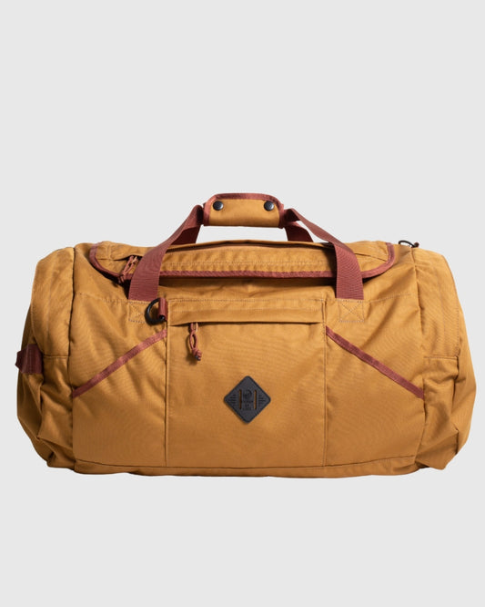 Camel (R)evolution™ 55L Carry-On Duffle (Front): Tan canvas duffle with burgundy handles, straps, front zip pocket, diamond logo patch