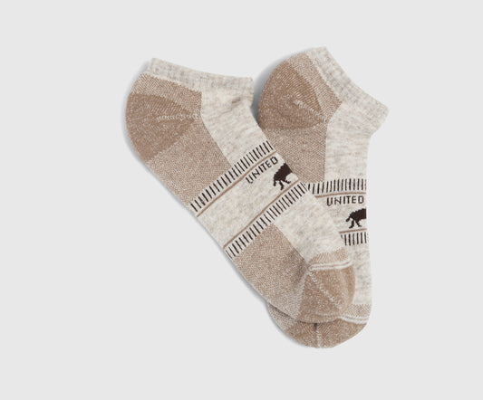 Taupe Bison Trail Low-Cut Sock (Flat-lay): Pair of ankle socks, tan and cream with bison logo and stripe details