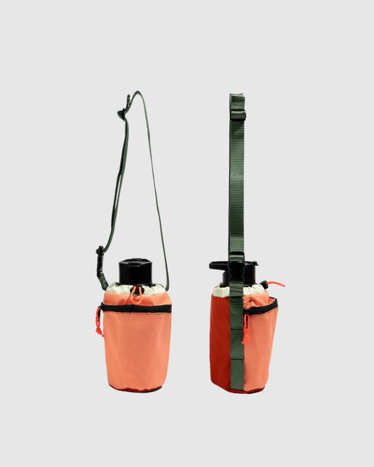 Coral Red Water Bottle Sling - Westward (Pre-Release) (Angle): Two coral red bottle slings with olive green straps, drawstring tops, small zip pockets