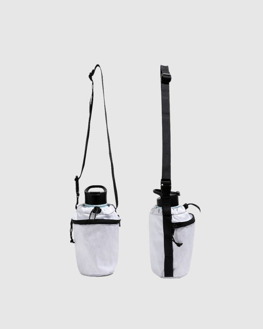 White Water Bottle Sling - Westward (Pre-Release) (Angle): Two white bottle slings with black drawstring tops, straps, and small zippered pockets