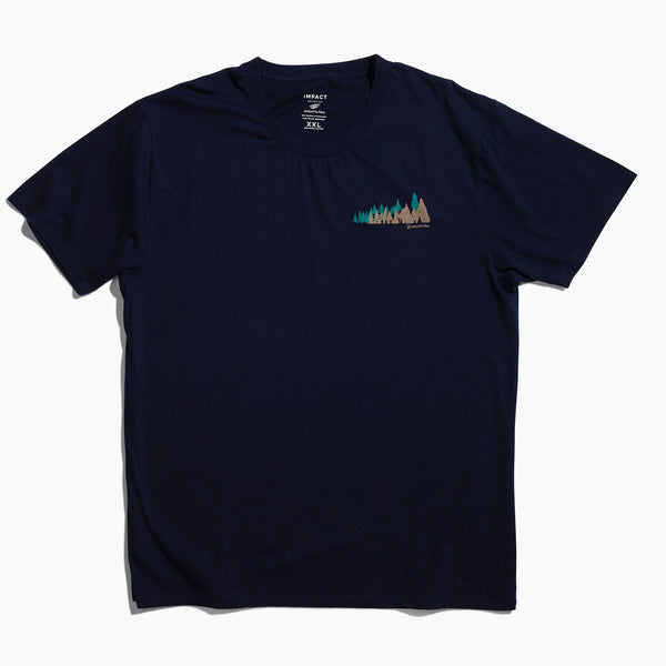 XS Moonlit Reflection Graphic Crew (Flat-lay): Navy blue crew neck tee with small forest trees graphic on chest