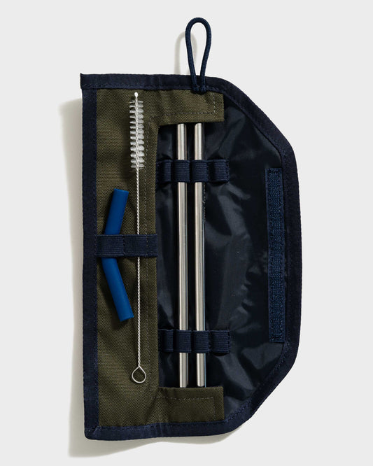 Olive The Straw Kit (Flat-lay): Open olive and navy roll case with two steel straws, brush, and blue silicone tips