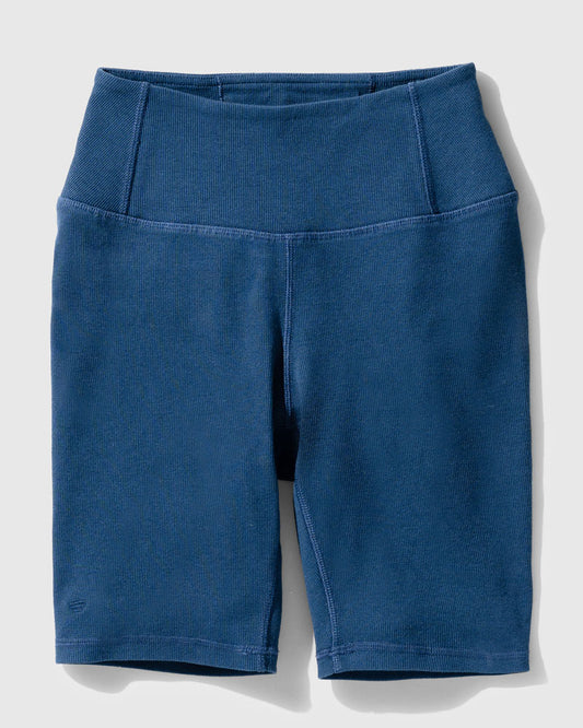 Midnight EcoKnit™ Ribbed Bike Short (Flat-lay): Dark blue ribbed bike shorts with wide waistband and seamed legs