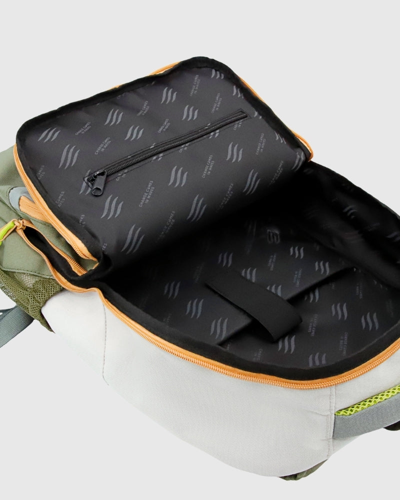 Olive (R)evolution™ 25L Transit Pack (Detail): Open interior showing black lining, zipper pocket, and orange trim accents