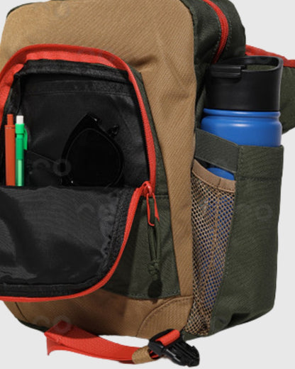 Olive (R)evolution™ 9L Sidekick (Detail): Open front pocket revealing sunglasses, pens, and side mesh water bottle holder