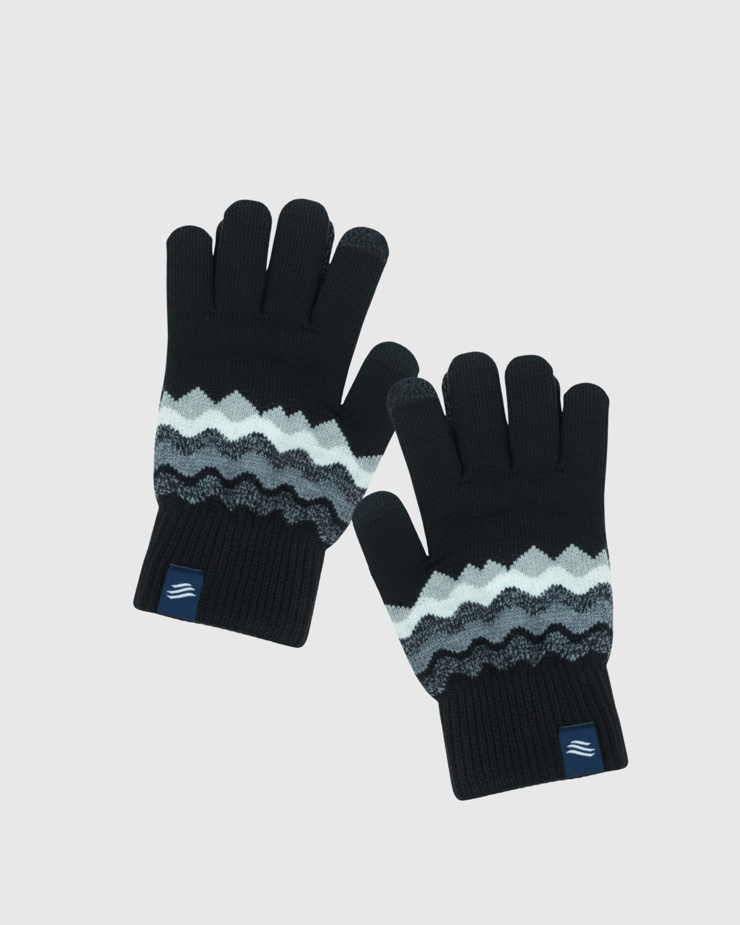 Black THE MERINO WOOL MOUNTAIN AND MARLED KNIT GLOVE 2 PACK (Angle): Black knit gloves with zigzag grey and white pattern bands near wrist