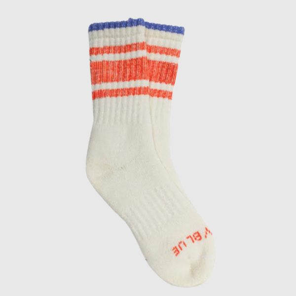 Off White The Hemp Yarn Varsity Hiker Full Cushion Boot Sock (Angle): Cream ribbed sock with red stripes, blue cuff, brand text on sole