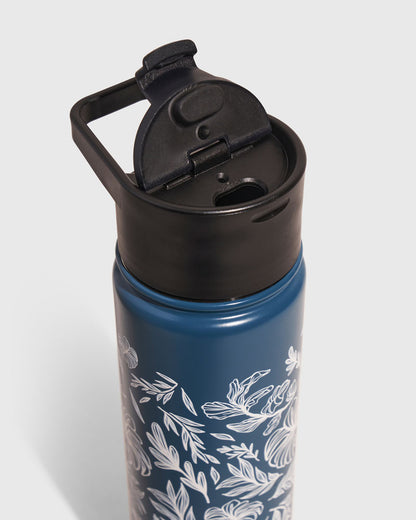 Rainstorm - Plants Bottle - 22 Oz. Insulated Stainless Steel (Detail): Close-up of dark blue bottle with white floral print and black flip-top lid
