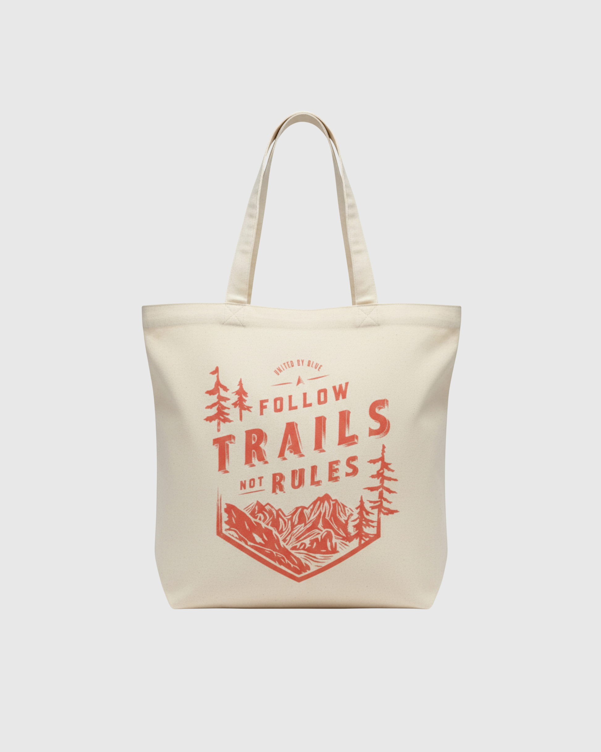 Follow Trails Not Rules My Favorite Daily Tote (Front): Cream canvas tote with red outdoor graphic, pine trees, mountains, two handles