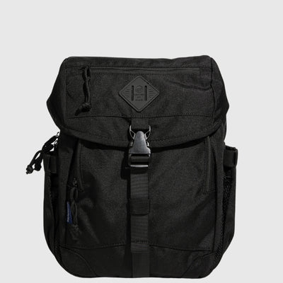 Black (R)evolution™ 9L Sidekick (Front): Black compact backpack with flap closure, buckle strap, and side mesh pocket