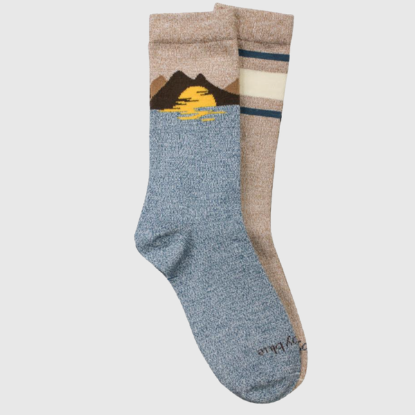 S/M The Soft Hemp Mountain Crew Sock - 2 Pack (Angle): Two mismatched crew socks: blue with mountain sunset print, tan with stripes