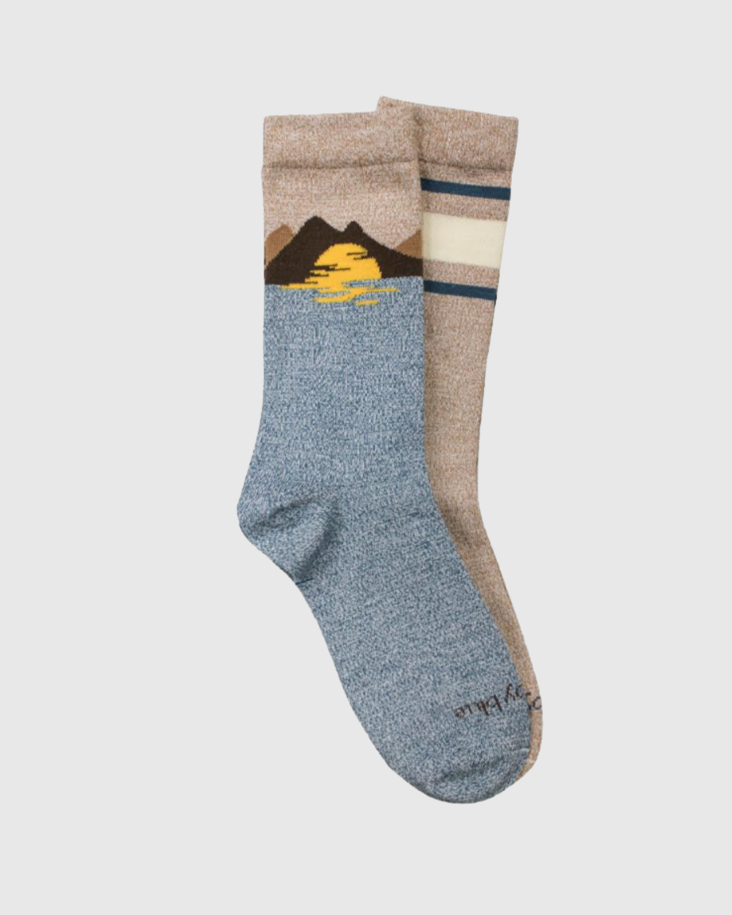 S/M The Soft Hemp Mountain Crew Sock - 2 Pack (Angle): Two mismatched crew socks, blue with mountain sunset print, tan with stripes