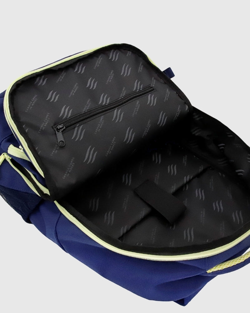 Black (R)evolution™ 25L Transit Pack (Detail): Open navy pack interior showing black lining, zip pocket, and divider