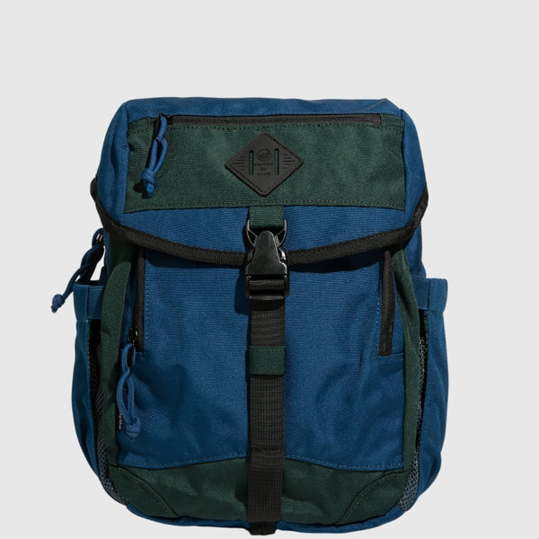 Blue W/ Green (R)evolution™ 9L Sidekick (Front): Two-tone blue and green backpack with front buckle strap and zipper pockets