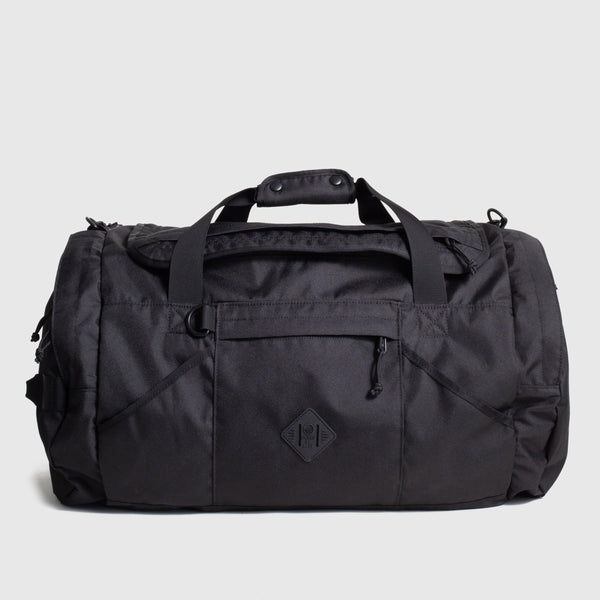 Black (R)evolution™ 55L Carry-On Duffle (Front): Black nylon duffle with top handles, front zip pocket, and diamond logo patch
