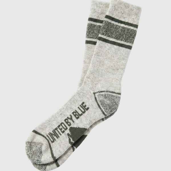 Wild Green Ultimate Bison Boot Sock - Imperfect Packaging (Angle): Light gray crew sock with dark green stripes, reinforced toe and heel