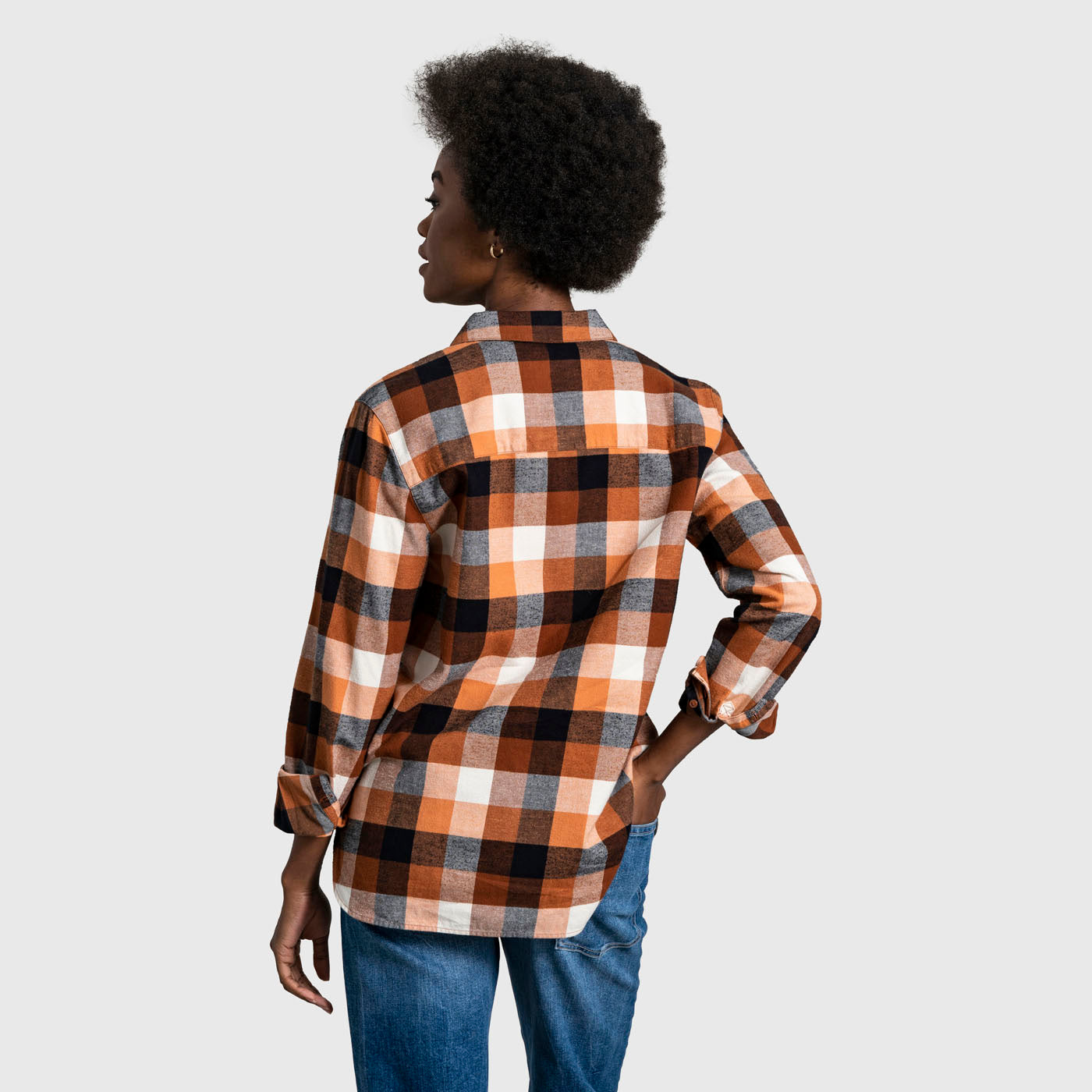 Sunburn The Responsible Flannel - Impact Collection (Back): Back view of orange, black, and white plaid flannel shirt on model