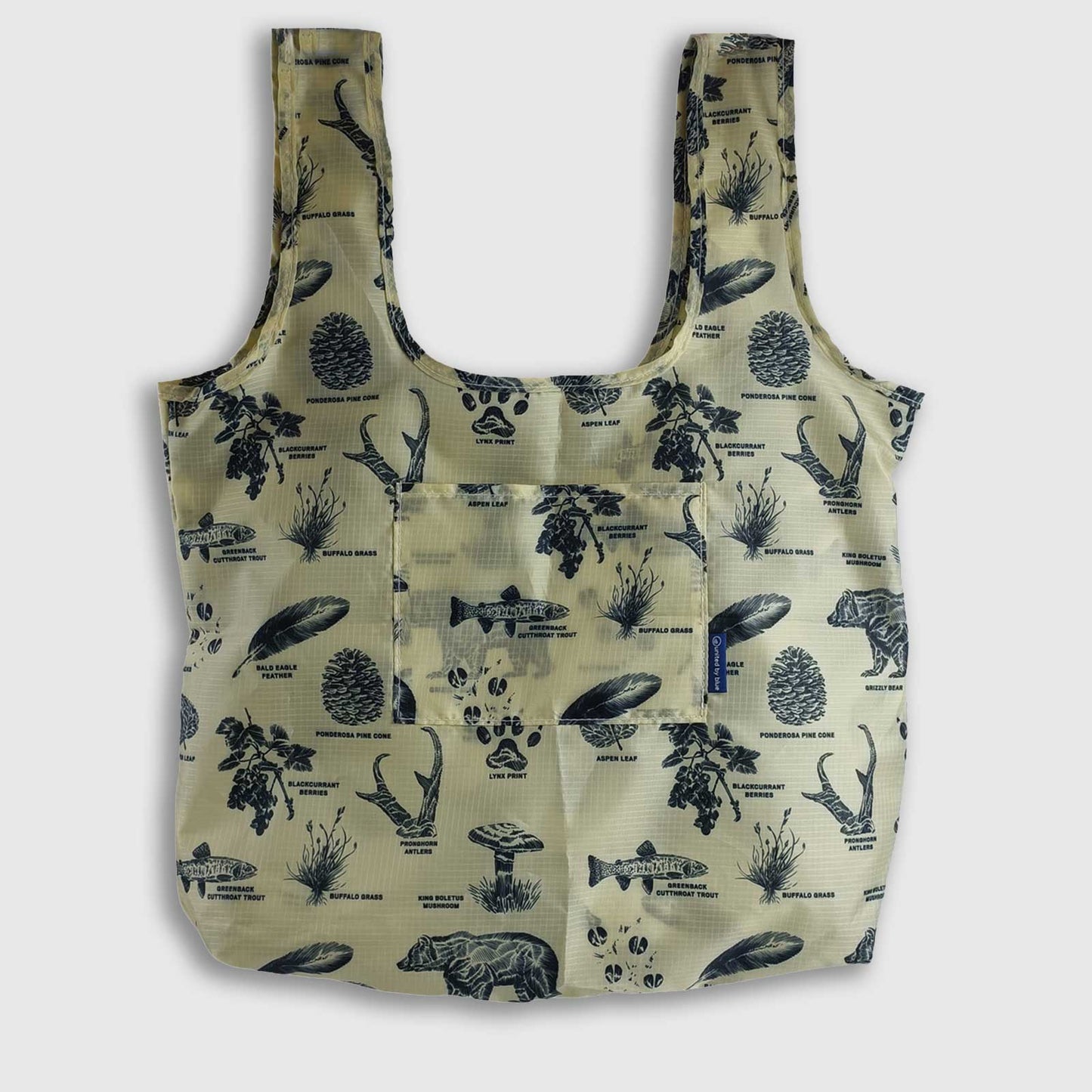 Grizzly The Packable Tote (Front): Tan tote with navy nature print, two straps, front pocket
