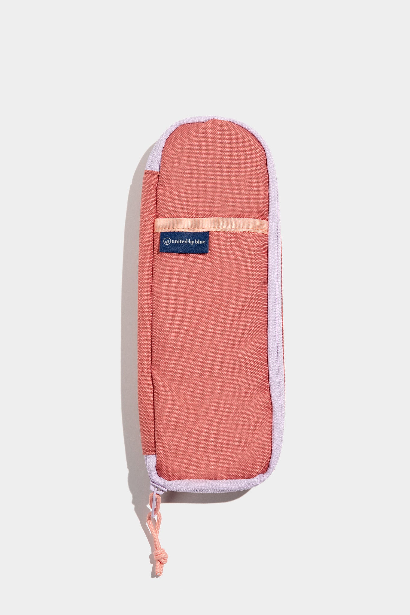 Mauve The Utensil Pack - Perfect for Packed Lunches (Flat-lay): Coral canvas pouch with lavender zipper trim, small front pocket, logo patch