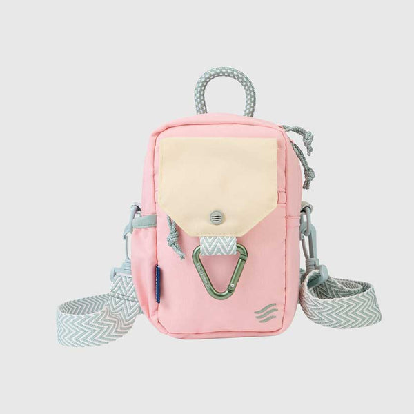 Lt Pink (R)evolution™ Daily Cross Body (Angle): Small pink crossbody bag with cream front pocket, carabiner clip, and woven strap