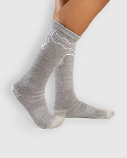 Save Our Seas - Heather Merino Wool - Graphic Crew Sock (In-use): Grey graphic merino crew socks worn on feet, side view