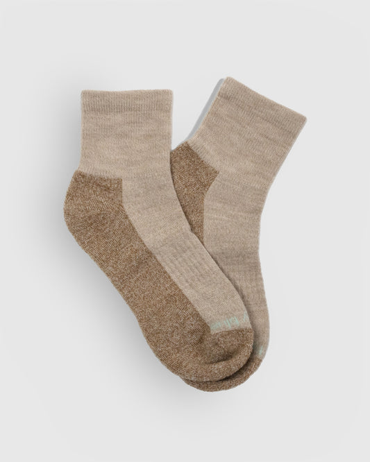Classic Beige Marled Merino Wool - Marled Quarter Sock (Flat-lay): Beige marled quarter socks with darker tan heel, sole and toe