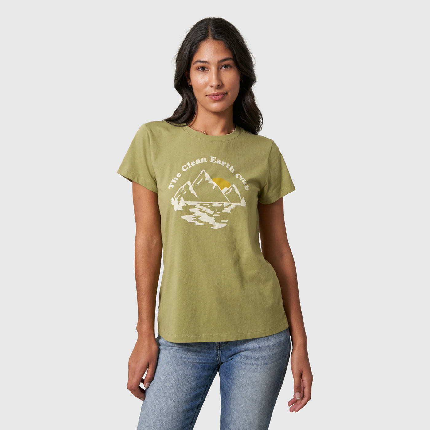 Sage The Clean Earth Club Graphic Tee (In-use): Woman wearing olive green tee with mountain landscape and arched text graphic