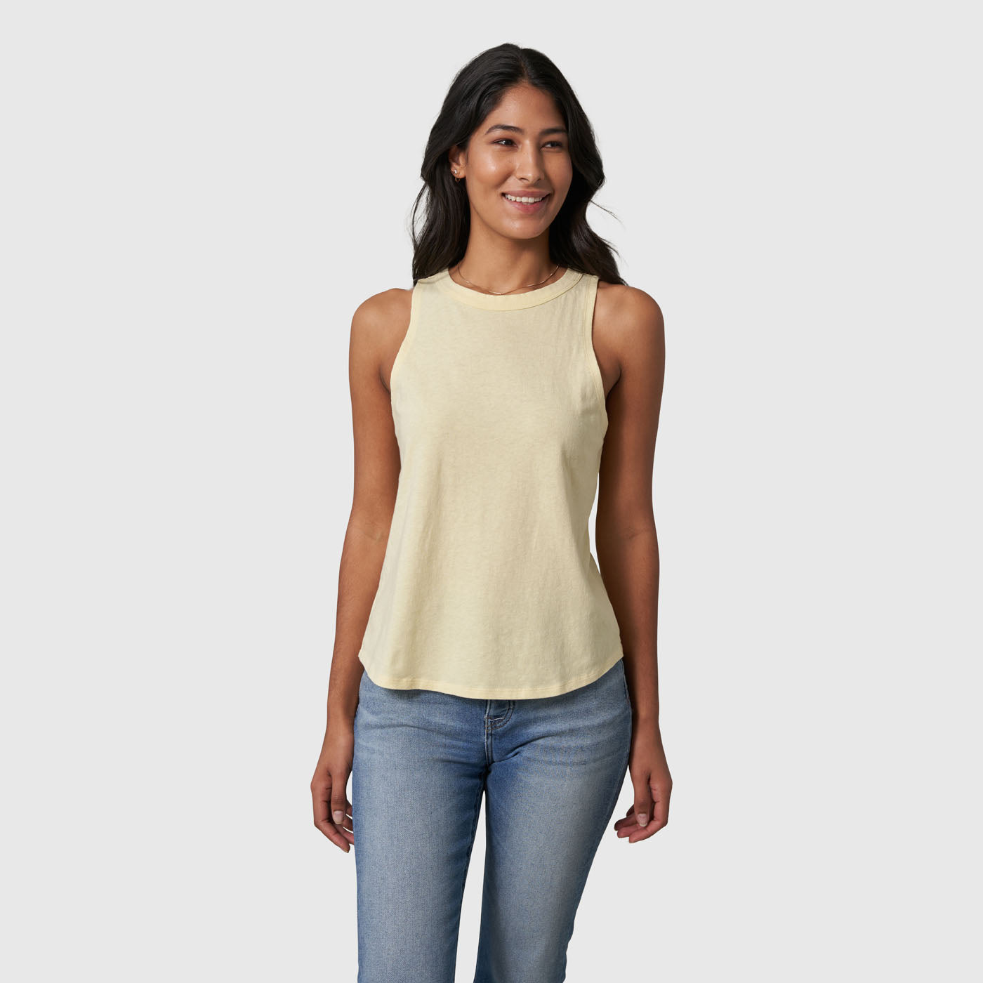 Yellow Women's SoftHemp™ High Neck Tank (Front): Pale yellow sleeveless tank with high crew neckline, worn with jeans