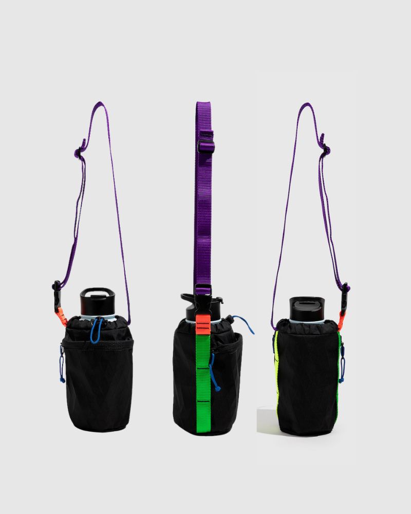 Black Neon Water Bottle Sling - Westward (Pre-Release) (Angle): Three views of black bottle sling with purple strap and neon accents