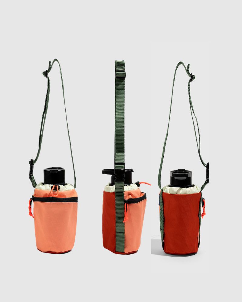Coral Red Water Bottle Sling - Westward (Pre-Release) (Angle): Three views of coral and red bottle sling with olive green adjustable strap