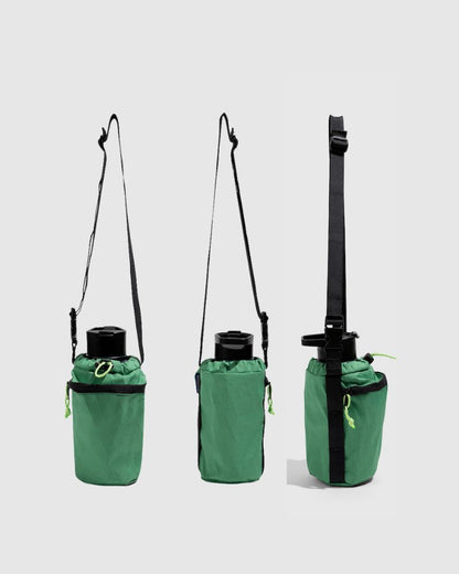 Evergreen Water Bottle Sling - Westward (Pre-Release) (Front): Three views of green bottle carrier with black crossbody strap and zipper pocket