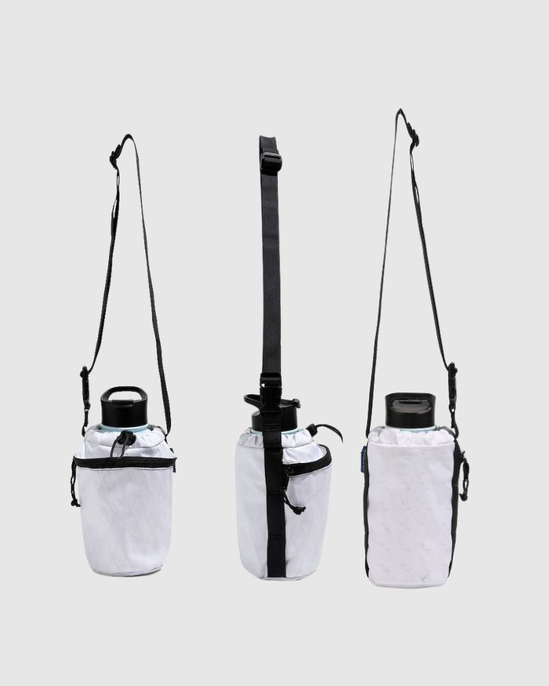 White Water Bottle Sling - Westward (Pre-Release) (Front): White fabric bottle carrier with black crossbody strap, shown three angles