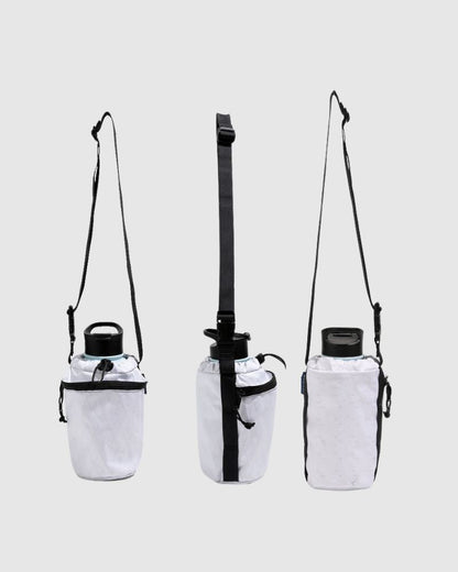 White Water Bottle Sling - Westward (Pre-Release) (Front): White fabric bottle carrier with black crossbody strap, shown three angles