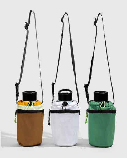 Water Bottle Sling - Westward (Pre-Release) (Front): Three insulated bottle slings in tan, white, and green with crossbody straps