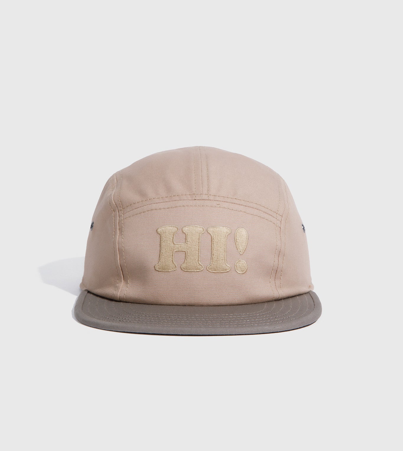Tan Hi Organic 5-Panel Hat (Angle): Tan five-panel cap with embroidered HI! text and darker gray brim