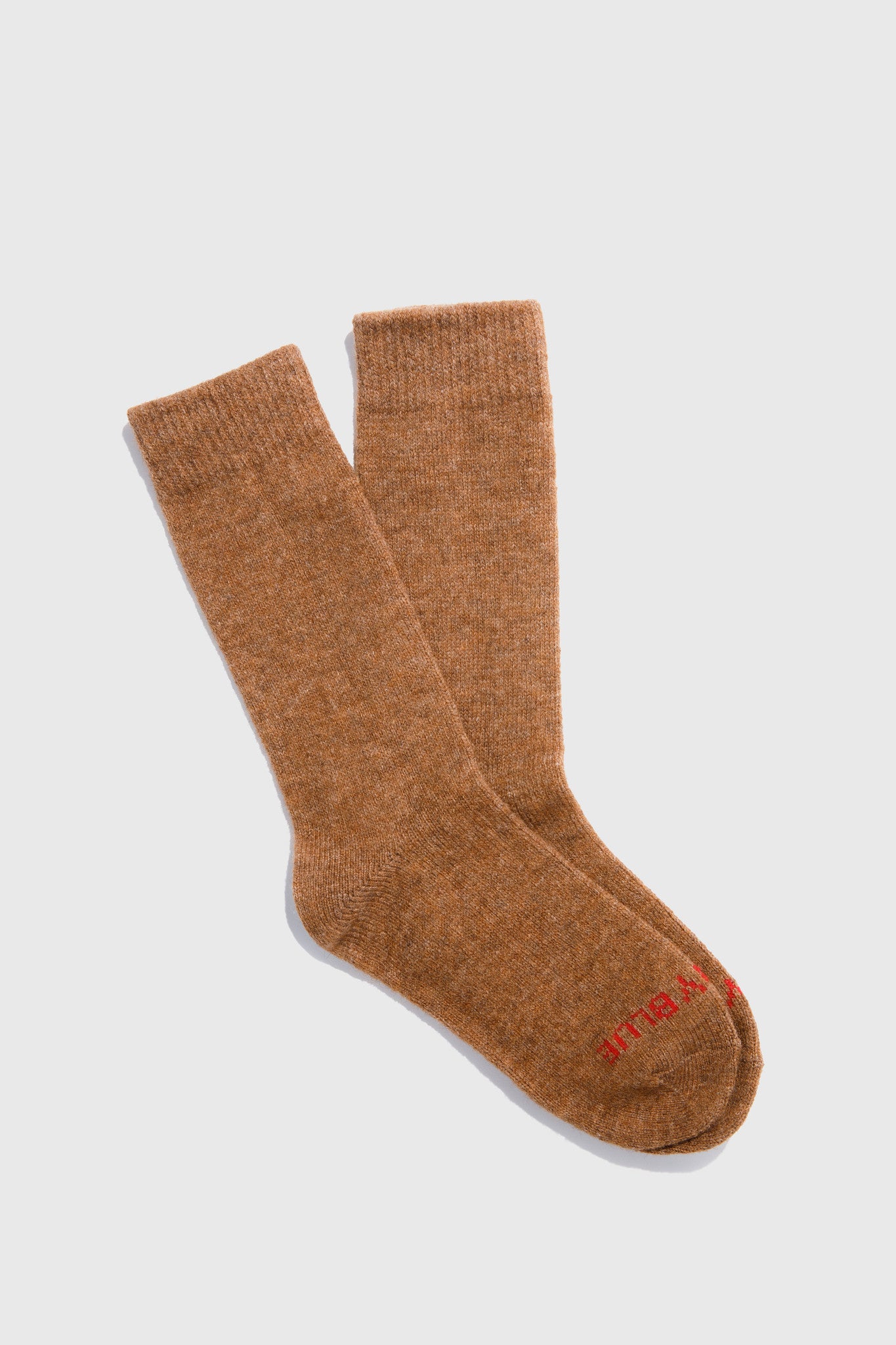 Sienna and Red Striped Yak Wool - Everyday Crew Sock - 2 Pack (Flat-lay): Pair of solid tan crew socks with red logo text on sole