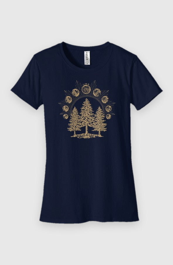 navy Womens Fit Graphic Tee in 100% Organic Cotton - Lunar Phases (Front): Fitted navy tee with gold pine trees beneath an arc of moon phases