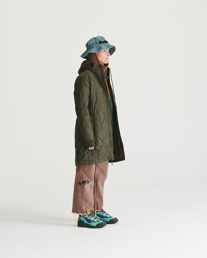 Sky Blue Organic Bucket Stash Hat (In-use): Light blue wide-brim bucket hat worn by person in profile view