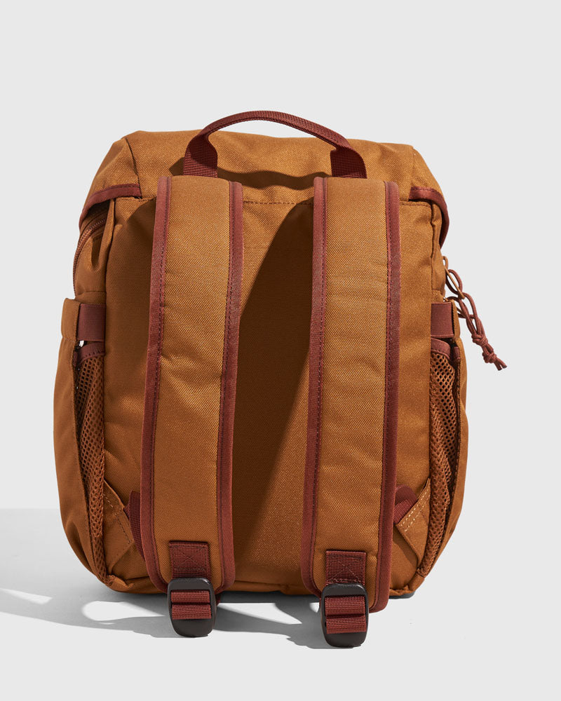 Camel (R)evolution™ 9L Sidekick (Back): Camel brown backpack showing padded back panel, shoulder straps, and buckles