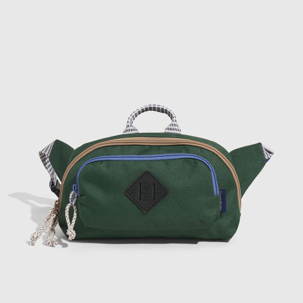 Pine (R)evolution™ 3L Utility Fanny Pack (Front): Dark green fanny pack with blue zipper, rope pull, and diamond logo patch