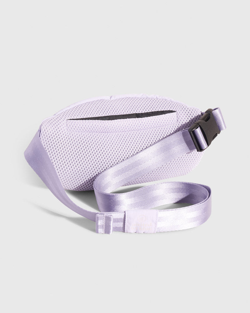 Lavender (Re)active™ 1L Fanny Pack (Back): Light purple fanny pack back, mesh panel, buckle clasp, adjustable strap