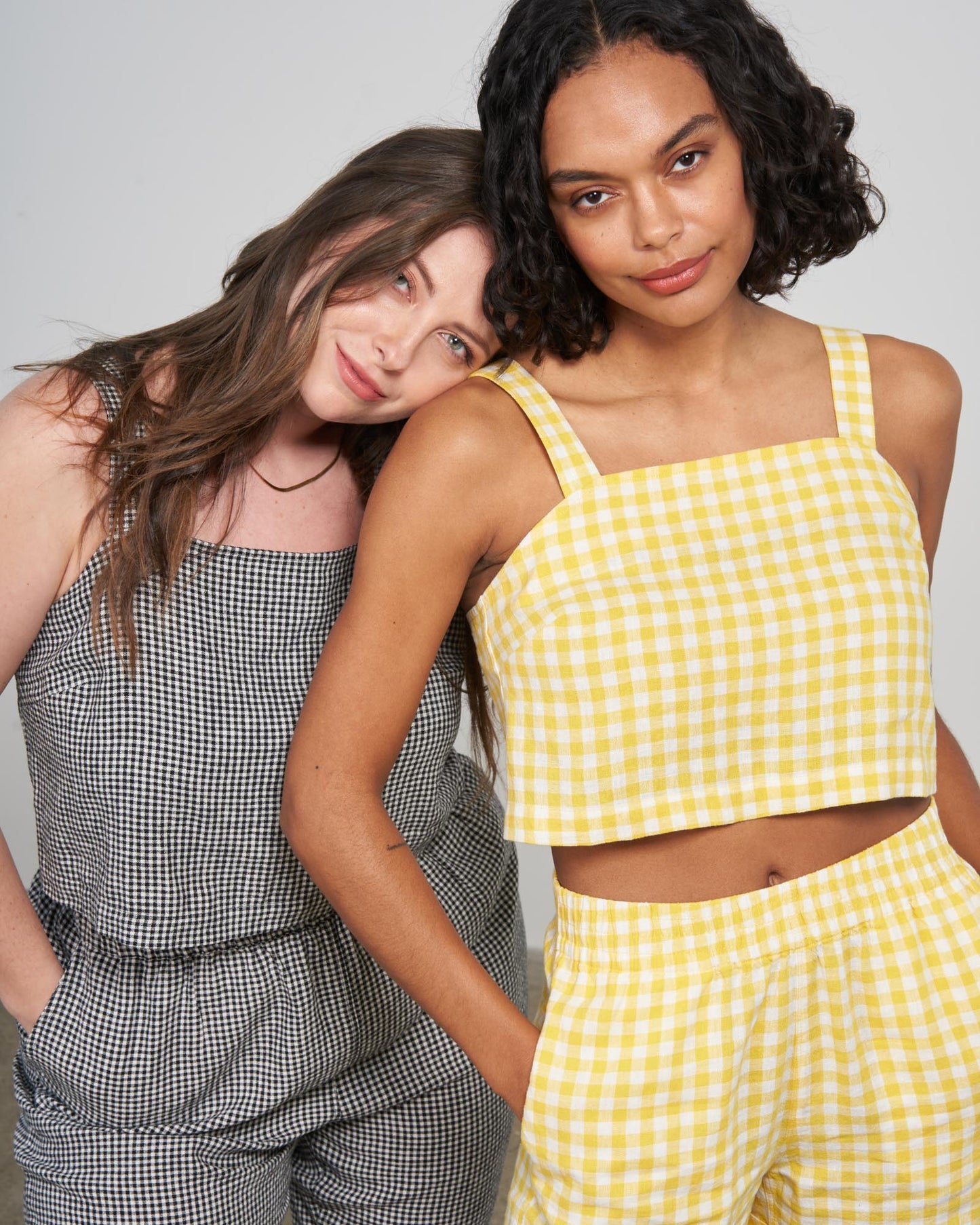 Cream Gold Linen Cropped Tank (In-use): Yellow and white gingham cropped tank with square neckline, worn by model