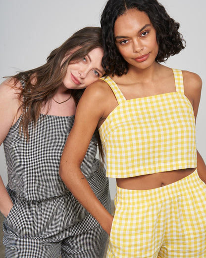 Cream Gold Linen Cropped Tank (In-use): Yellow and white gingham cropped tank with square neckline, worn by model