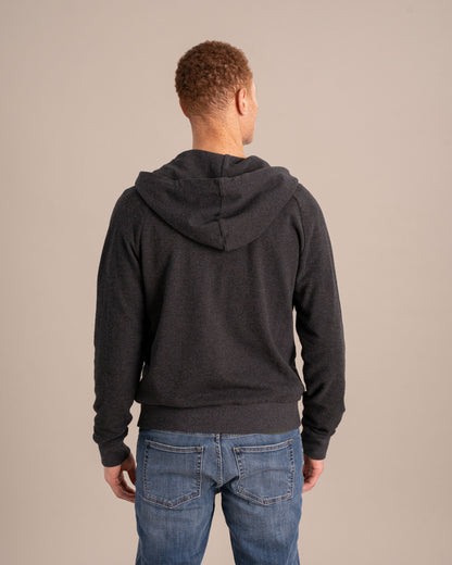 Sudadera orgánica con capucha y cremallera tipo raglán