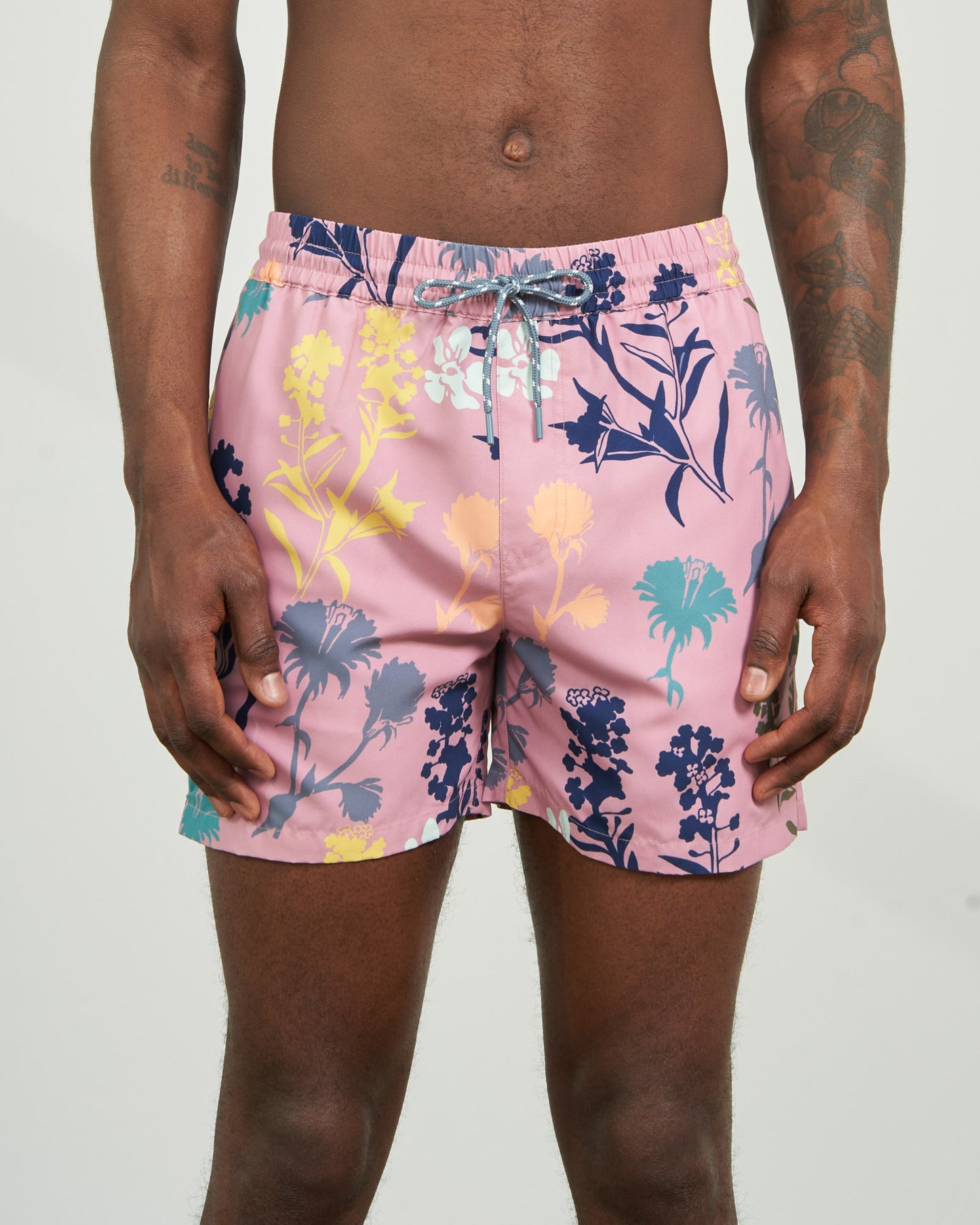 Foxglove Recycled Swim Trunk - 5" (Front): Pink floral swim trunks with elastic waist and light blue drawstring