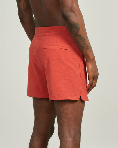 Ketchup The Responsible Board Short - 5" (Angle): Coral red shorts, rear angle, single back welt pocket, split hem
