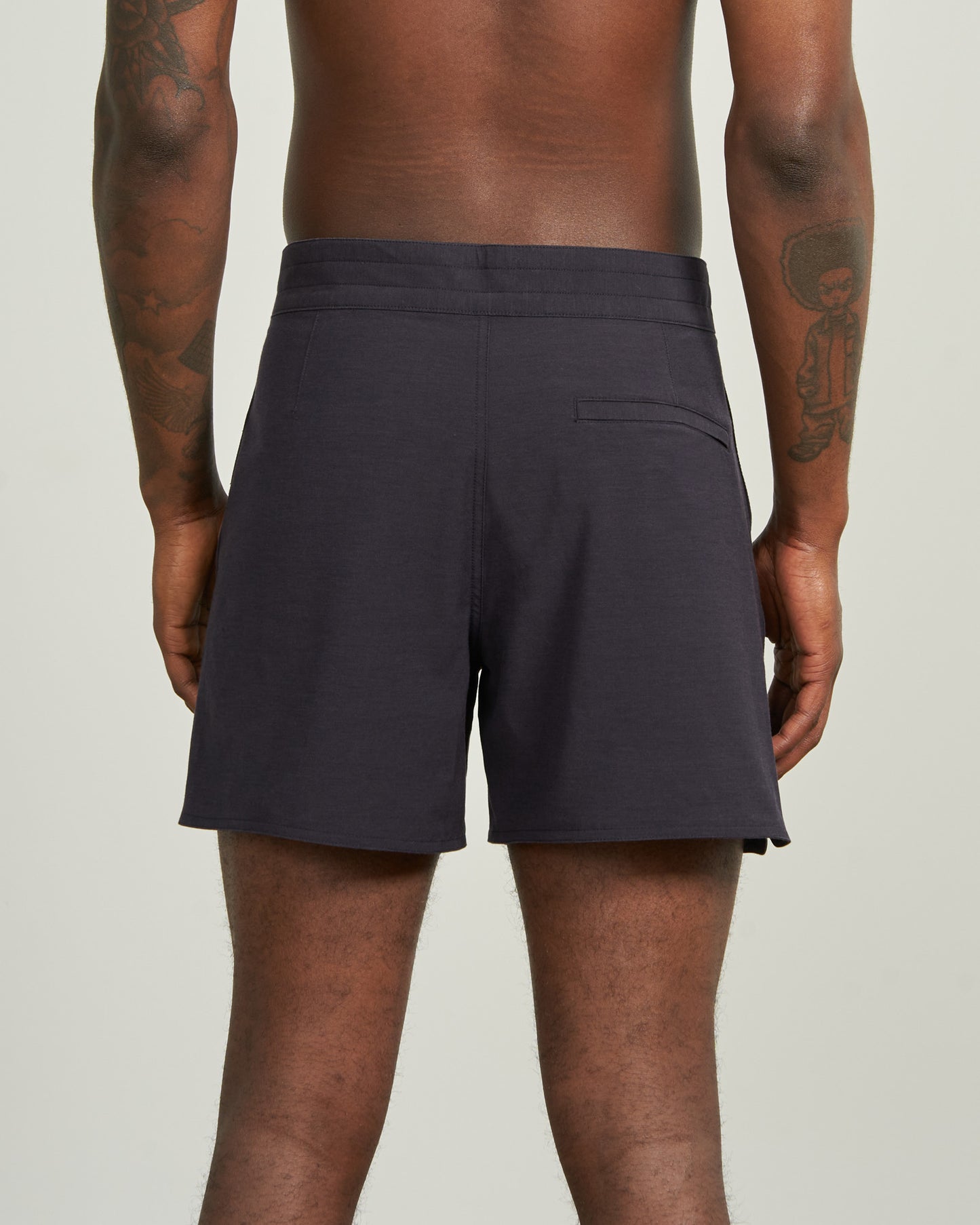 Night Sky The Responsible Board Short - 5" (Back): Dark navy shorts, back view, single welt pocket, elastic waistband