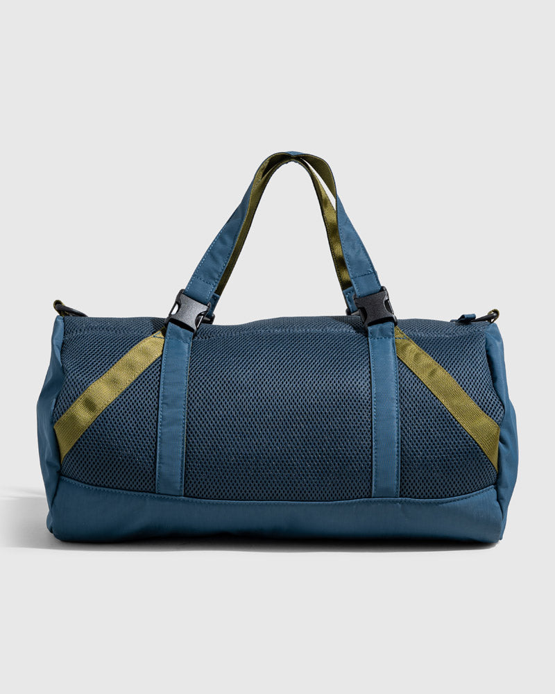 Blueberry (Re)active™ 16L Mini Duffle (Front): Teal mesh cylindrical bag with olive accent straps and top handles